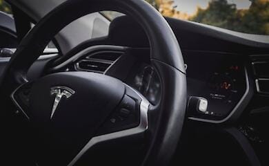 Elon Musk plans to cut Tesla staff