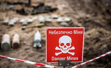 In Kyiv, rescuers check the beaches for mines