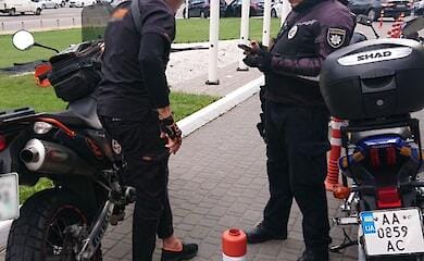 Police stop motorcyclist with fake ID