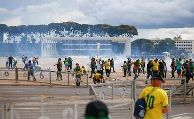 Ex-president's fans in Brazil storm Congress and presidential palace
