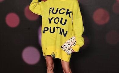 Ukrainian supermodel Alina Baykova appeared in a dress with an appeal to Putin at the opening of Fashion Week