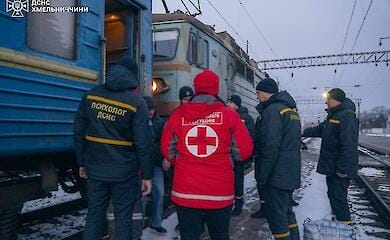 Evacuation trains are met by Red Cross volunteers