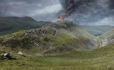 Reconstruction of Tinnis Late Iron Age Fort ablaze