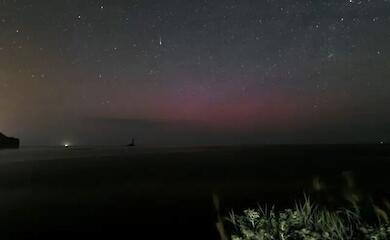A scarlet glow over Japan gave away a major space storm