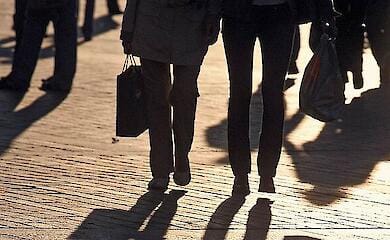 Why is it difficult for displaced persons to find work, even when there is a labour shortage?