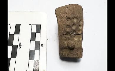 Archaeologists have discovered mysterious markings on a 2,700-year-old figurine