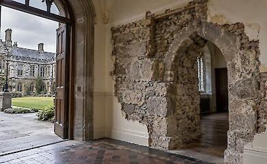 Medieval stonework discovered beneath the plaster of a later university building